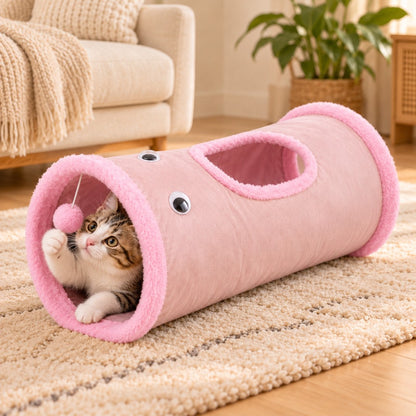 Pink foldable cat tunnel with peekaboo opening and hanging pom-pom
