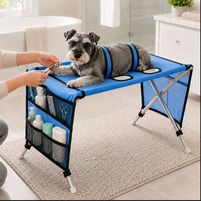 Blue foldable pet grooming table used for small dog nail trimming