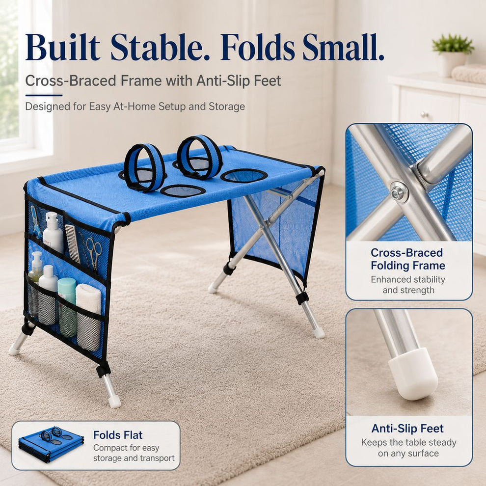 Blue foldable pet grooming table with side pockets and stable frame