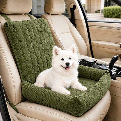 Sage green high back corduroy pet car seat bed with a small dog