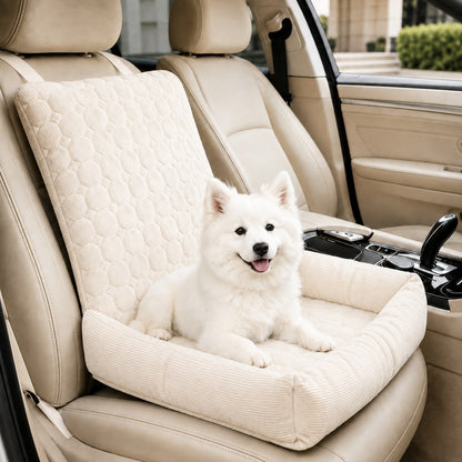 Ivory high back corduroy pet car seat bed with a small dog